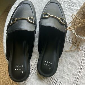 A New Day Black Mules with Gold Detail